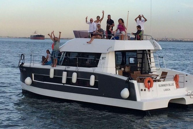 1H power catamaran up to 18 people in Lisbon - Under the 25th April Bridge
