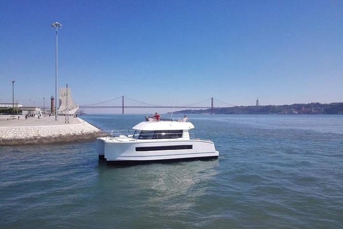 1H power catamaran up to 18 people in Lisbon - Belém Tower From the Water