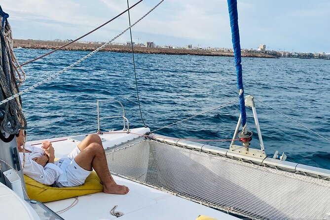 2 hour Catamaran Boat Tour - Sailing north toward La Mata or south to Punta Prima
