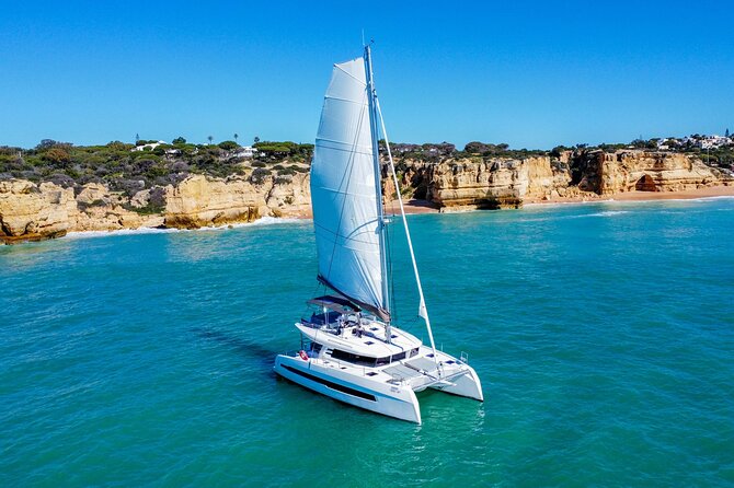 2h30 Private Sunset Catamaran Adventure in Albufeira - Arco do Triunfo, Gruta do Capitão, and Praia do Submarino