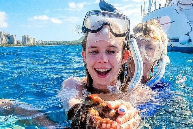 2hr Luxury Private Sailing Catamaran for 7-12 People - Snorkeling, swimming, and the sunken barge