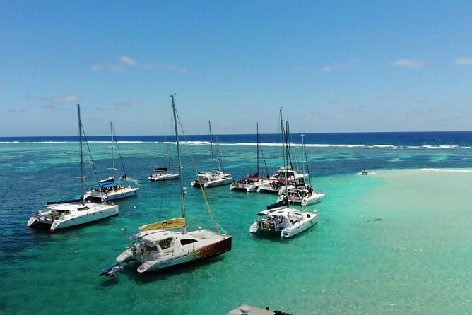 3 North Islands Catamaran Cruise with Lunch & Drinks on island. - Snorkeling, swimming, and the real pace of the day