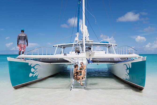 4-Hour Catamaran Sail and Snorkel Tour from Grace Bay - Snorkeling the reef in warm turquoise water