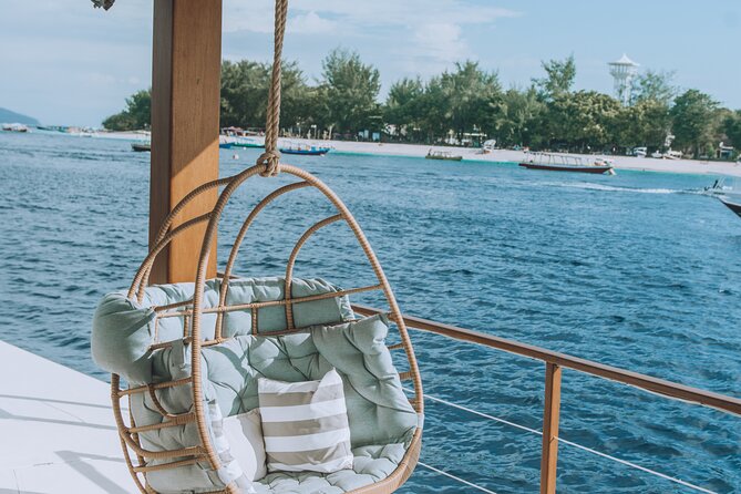 4-in-1 • Gili Islands Half-day Snorkel & Lunch Catamaran Tour - Life on deck after the snorkeling