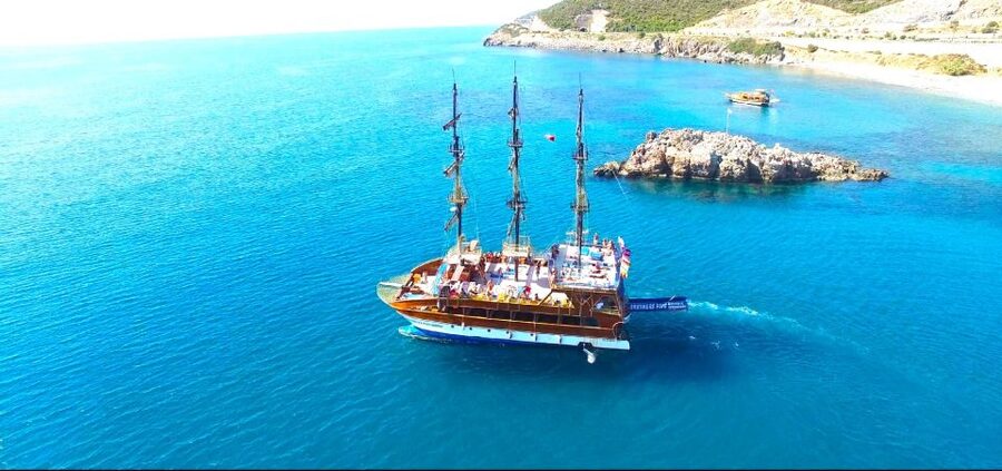 Alanya: Catamaran Boat Trip with Swim Stops and Sunbathing - Pirates Cave, Lovers Cave, and Phosphorus Cave from the rail