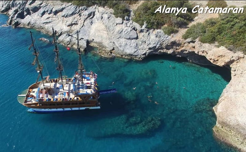 Alanya: Catamaran Boat Trip with Swimming Stops incl Lunch - Seeing Alanya Castle from the Mediterranean