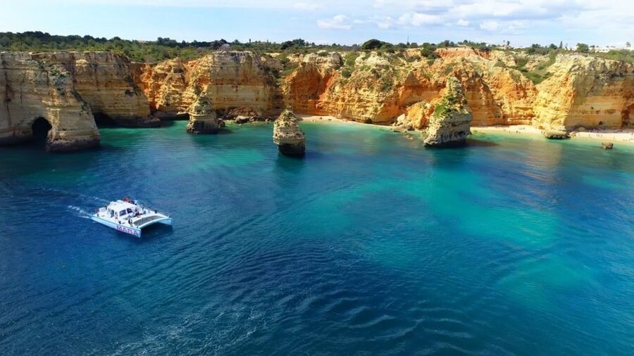 Albufeira: Catamaran Cruise with BBQ & Open Bar on the Beach - The dinghy ride and beach arrival