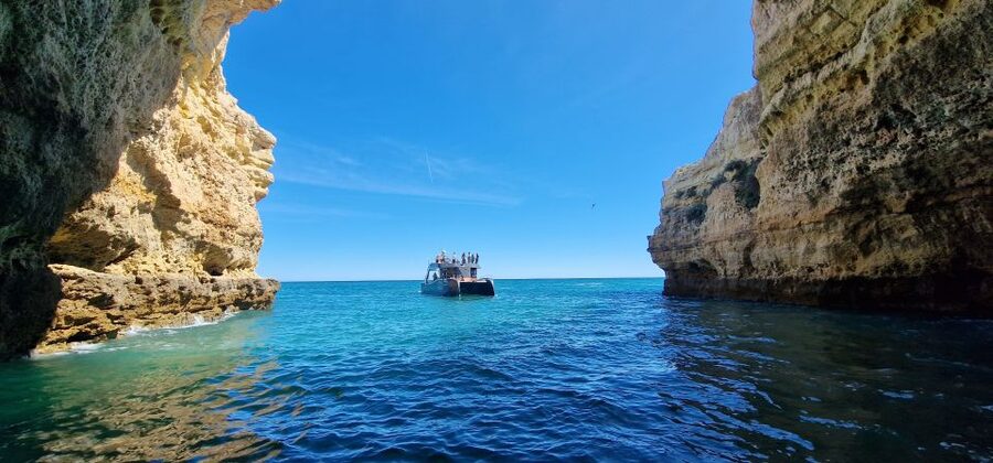 Albufeira: Coastline and Benagil Caves Tour by Catamaran - Reaching the Benagil Sea Cave