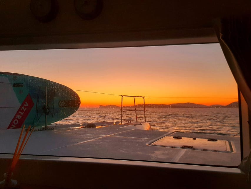 Alghero catamaran sunset tour Alghero - Crew, languages, and group atmosphere
