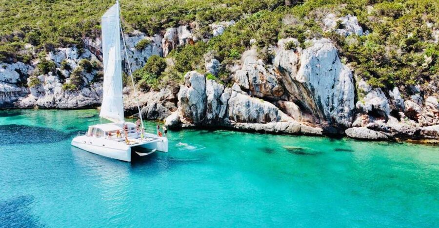 Alghero: Full day on a catamaran in Porto Conte Natural Park - Dragunara Cove and lunch on board