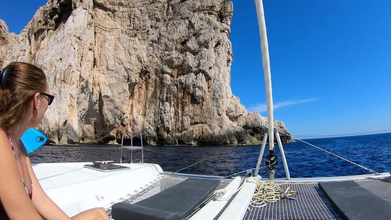 Alghero: Scenic Catamaran Cruise with Lunch and Snorkeling - What the swim and snorkeling stops are like