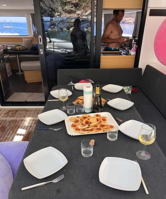 Alghero: Scenic Catamaran Cruise with Lunch and Snorkeling - Is $226.57 a fair price?