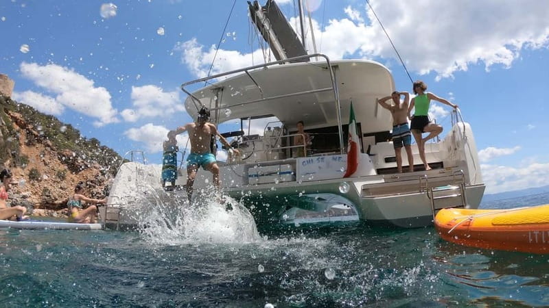 Alghero: Scenic Catamaran Cruise with Lunch and Snorkeling - Sailing into Porto Conte and Capocaccia