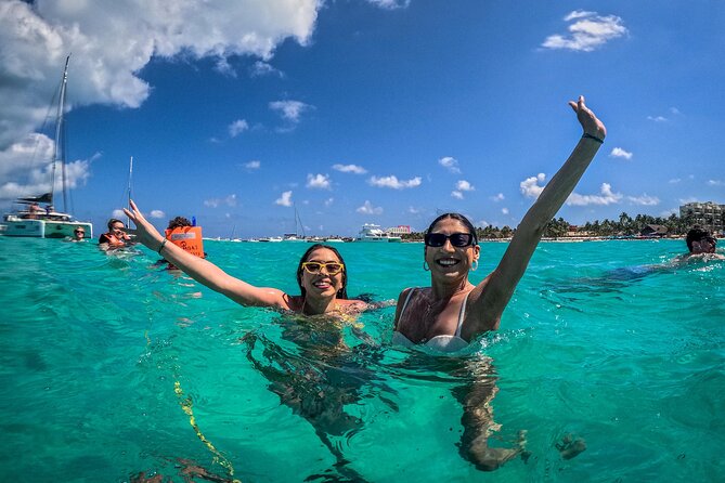 All-Inclusive Isla Mujeres Catamaran with Free Transportation - Lunch, beach time, and the Blanquizal sandbar