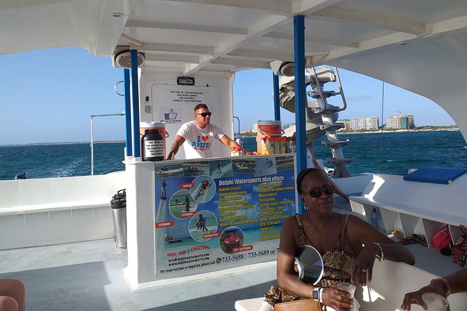 Aruba Sunset Sail Cruise Aboard The Dolphin Catamaran - The swim stop, rope swing, and waterslide