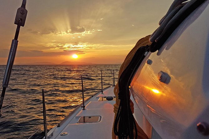 Athens Private Luxury Catamaran Cruise with Traditional Greek Meal and BBQ - First swim: towels, water, and the Athens coast