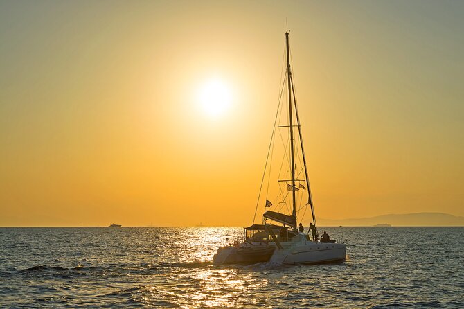 Athens Semi Private Sunset Catamaran Cruise with meal & drinks - Seafood pasta, Greek sides, and drinks on deck