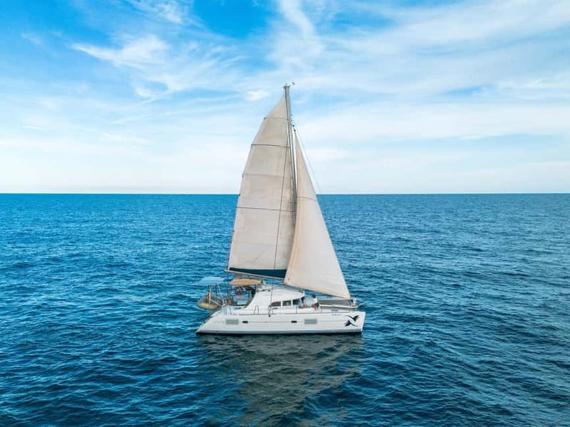 Barcelona: Catamaran Cruise w/ Sailing, Wine, & Tapa - Languages, timing, and flexible booking