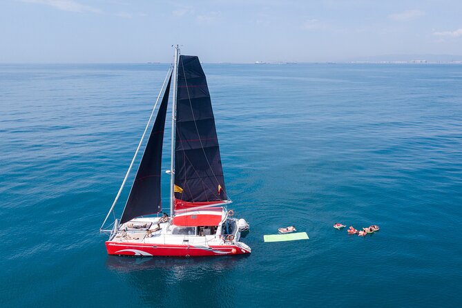 Barcelona Catamaran Cruise with Tapa & Drink Included - Weather can make or break the outing
