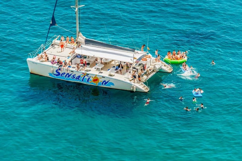 Barcelona: Catamaran Party Cruise with BBQ Meal - The first hour: Barcelona’s coast by catamaran