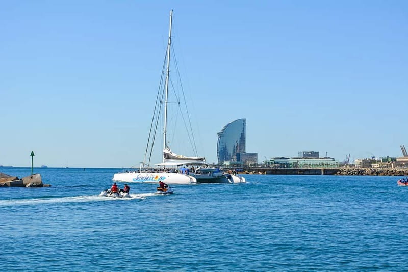 Barcelona: Catamaran Party Cruise with BBQ Meal - The Badalona swimming stop