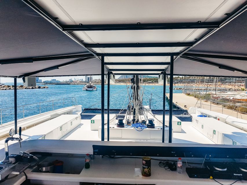 Barcelona: Catamaran Party Cruise with BBQ Meal - Music, dancing, and the crew’s role