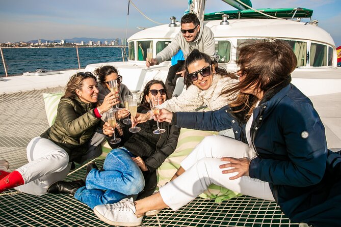 Barcelona Small Group Trip by Catamaran w Tapas, Cava and Sunset - Tapas and cava around Port Vell