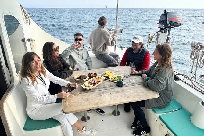 Barcelona Small Group Trip by Catamaran w Tapas, Cava and Sunset - Swimming and SUP boards when conditions allow