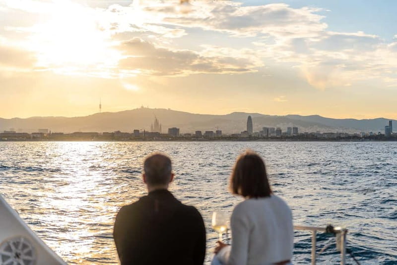 Barcelona: Sunset Catamaran Cruise with Wine and Tapa - Sunset, wine, and a Mediterranean tapa