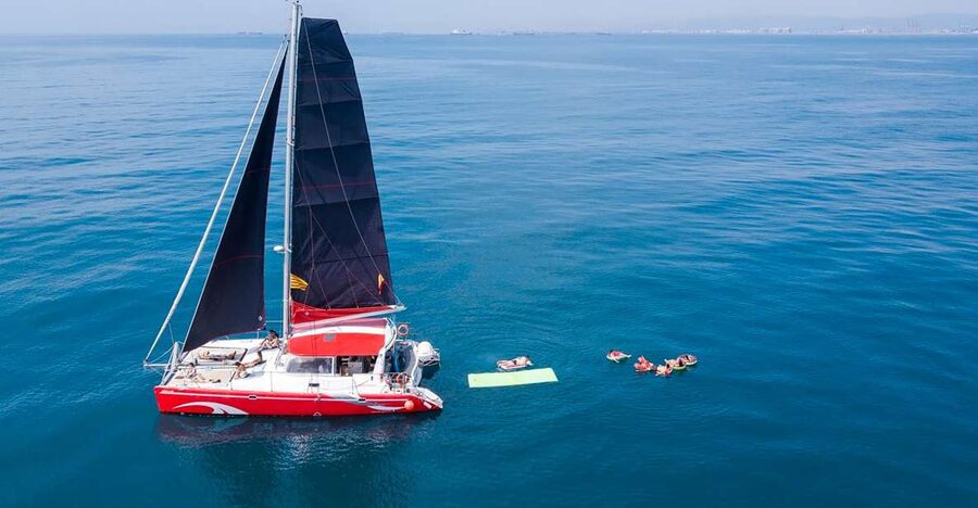 Barcelona: Sunset or Day Catamaran Cruise with Tapa & Drink - The Barcelona catamaran experience at a glance