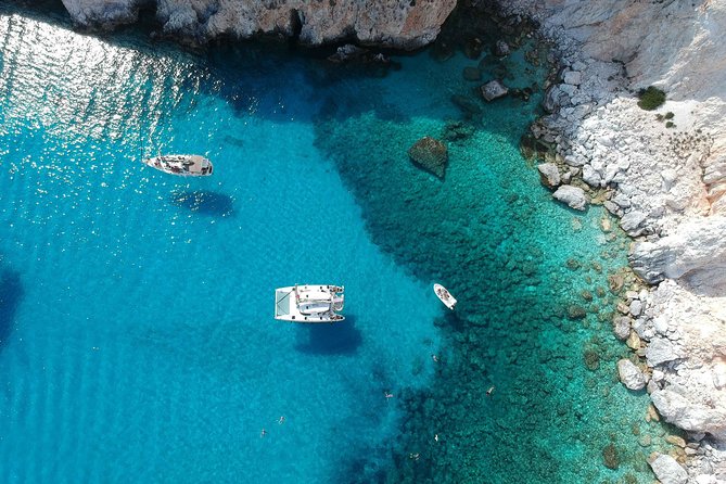 Best of Milos and Poliegos Catamaran snorkelling Cruise with BBQ - Kleftiko, pirate caves, and the main swimming session