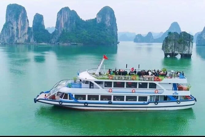 Best Selling Catamaran Cruise Premium Day Trip Explore Halong Bay - Sunset on the way back to Tuan Chau Harbor
