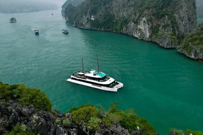 Best Selling Catamaran Cruise Premium Day Trip Explore Halong Bay - Boarding the catamaran around midday