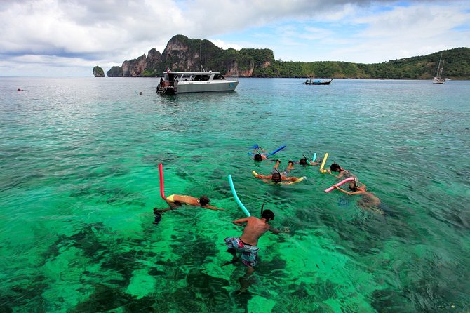 Blu Anda Catamaran to Phi Phi from Phuket - Tonsai Bay and Phi Phi’s crowded side