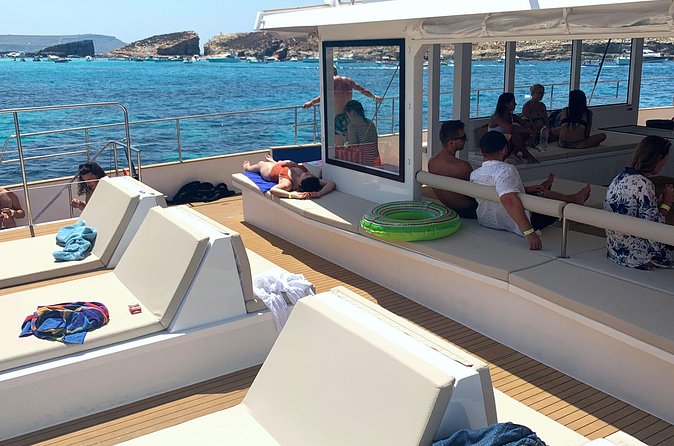 Blue Lagoon Evening Catamaran Cruise - The boat, seating, and crowd size