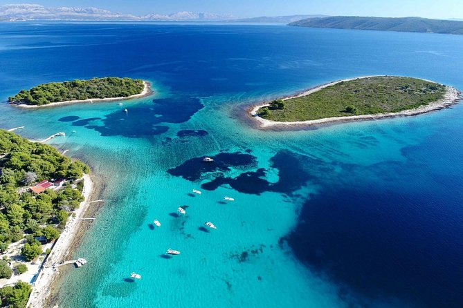 Blue Lagoon, Trogir & Čiovo catamaran tour with Food and Drinks - Blue Lagoon and Krknjasi Bay: your first swim