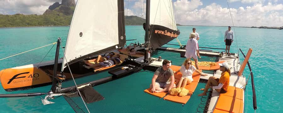 Bora Bora: Half Day Catamaran Sailing & Snorkelling - Speedboat pickup gets the outing moving