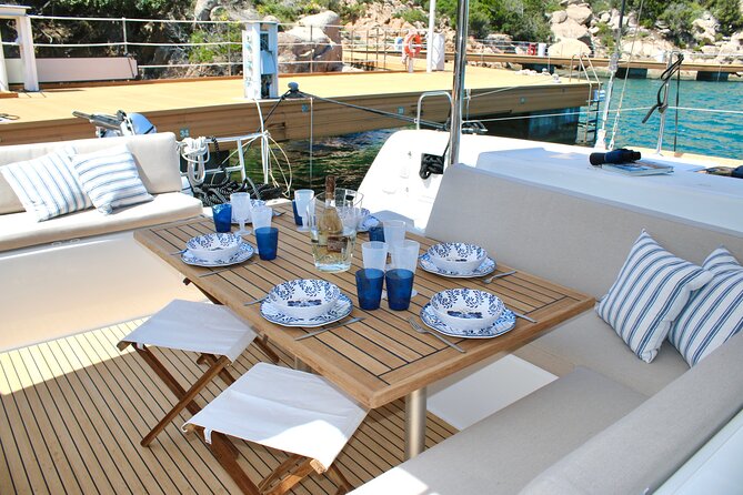 By Catamaran to the La Maddalena Archipelago from Poltu Quatu - The first swim and the opening fruit service