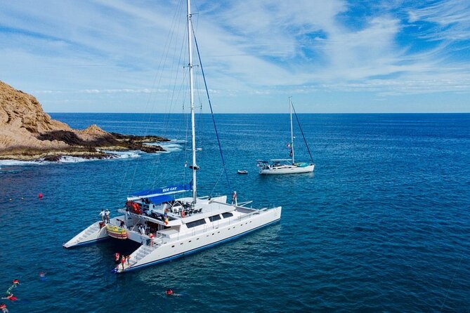 Cabo San Lucas Catamaran Cruise: Snorkel or Sunset Adventure - Weather, timing, and service risks