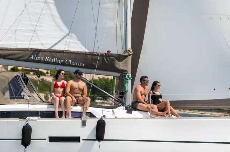 Cagliari: Catamaran Tour, Swimming, Snorkeling, & Prosecco - Cala Bernat and the first coastal views