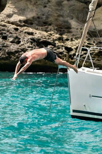 Cagliari: Catamaran Tour, Swimming, Snorkeling, & Prosecco - The return to Cagliari by catamaran