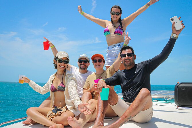 Cancun Catamaran: Isla Mujeres, Snorkeling, Drinks & Buffet Lunch - Open bar and onboard service