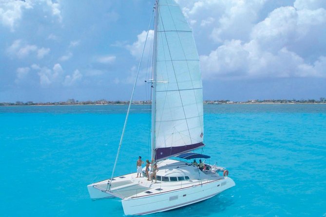 Cancun Half-Day Sailing Catamaran Cruise to Isla Mujeres - Leaving Playa Langosta around noon