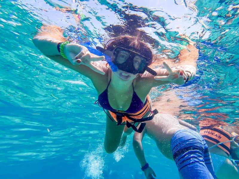 Cancun: Isla Mujeres Catamaran Ride, Open Bar & Buffet Lunch - Reef snorkeling before Isla Mujeres