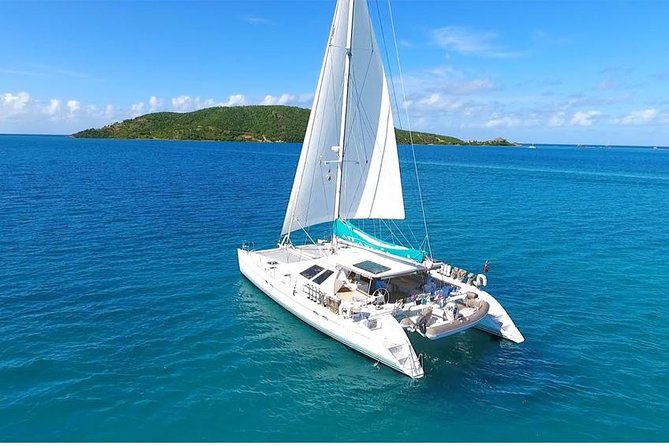 Catamaran Adventure Full Day: Ile aux cerfs,GRSE Waterfall,Snorkeling &BBQ Lunch - Ile aux Cerfs: beach time with a busy side
