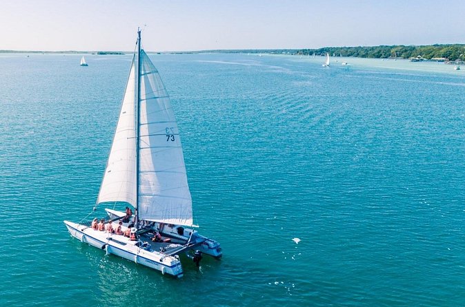 Catamaran Adventure: Navigate the Seven Colors - Cenote Cocalitos and Cenote Esmeralda