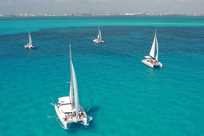 Catamaran adventure to Isla Mujeres with Snorkel,Buffet,Open Bar and Beach Club - What the staff does well