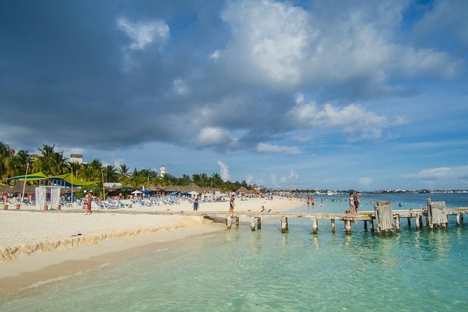 Catamaran adventure to Isla Mujeres with Snorkel,Buffet,Open Bar and Beach Club - Timing, pickup, and the group size