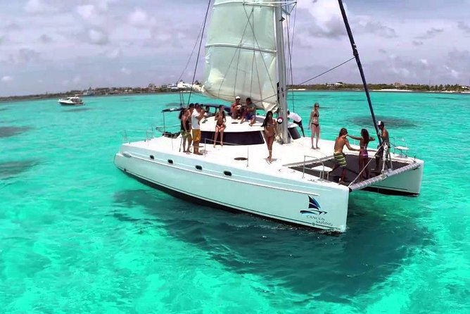 Catamaran adventure to Isla Mujeres with Snorkel,Buffet,Open Bar and Beach Club - Weather and the cancellation question