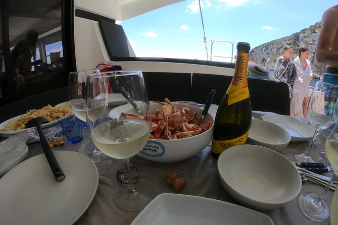 Catamaran Alghero, Catamaran Sailing Day Trip - Max, the skipper who also cooks lunch